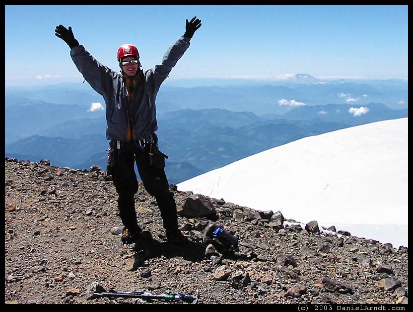 Climb of Mount Rainier: Daniel on the summit with Mount St Helens in the background Climb of Mount Rainier: Daniel on the summit with Mount St Helens in the background