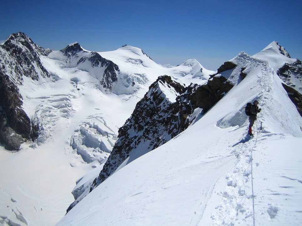 Lyskamm ridge traverse and Castor: Claus-Dieter on the ridge traverse from Lyskamm East to Lyskamm West summit; in the background from left to right: Dufourspitze (with Grenzgletscher), Zumsteinspitze, Signalkuppe, and Parrotspitze Lyskamm ridge traverse and Castor: Claus-Dieter on the ridge traverse from Lyskamm East to Lyskamm West summit; in the background from left to right: Dufourspitze (with Grenzgletscher), Zumsteinspitze, Signalkuppe, and Parrotspitze