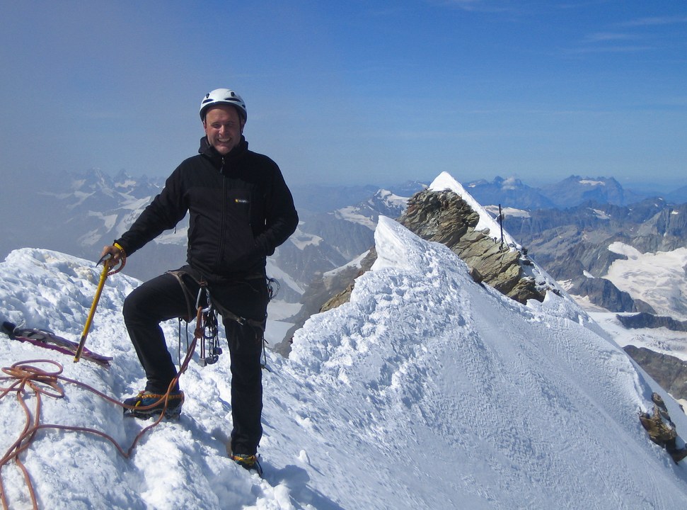 Matterhorn via Hörnli ridge: Peter on the Swiss summit of the Matterhorn with the Italien summit behind Matterhorn via Hörnli ridge: Peter on the Swiss summit of the Matterhorn with the Italien summit behind