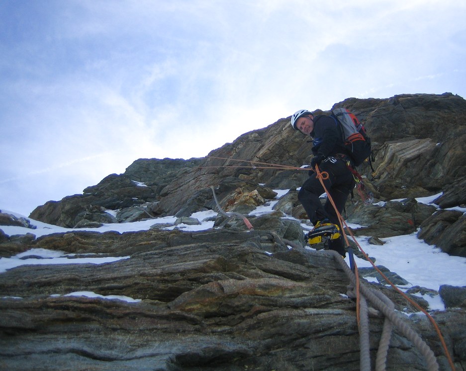 Matterhorn via Hörnli ridge: Peter rappelling the Moseley slabs Matterhorn via Hörnli ridge: Peter rappelling the Moseley slabs
