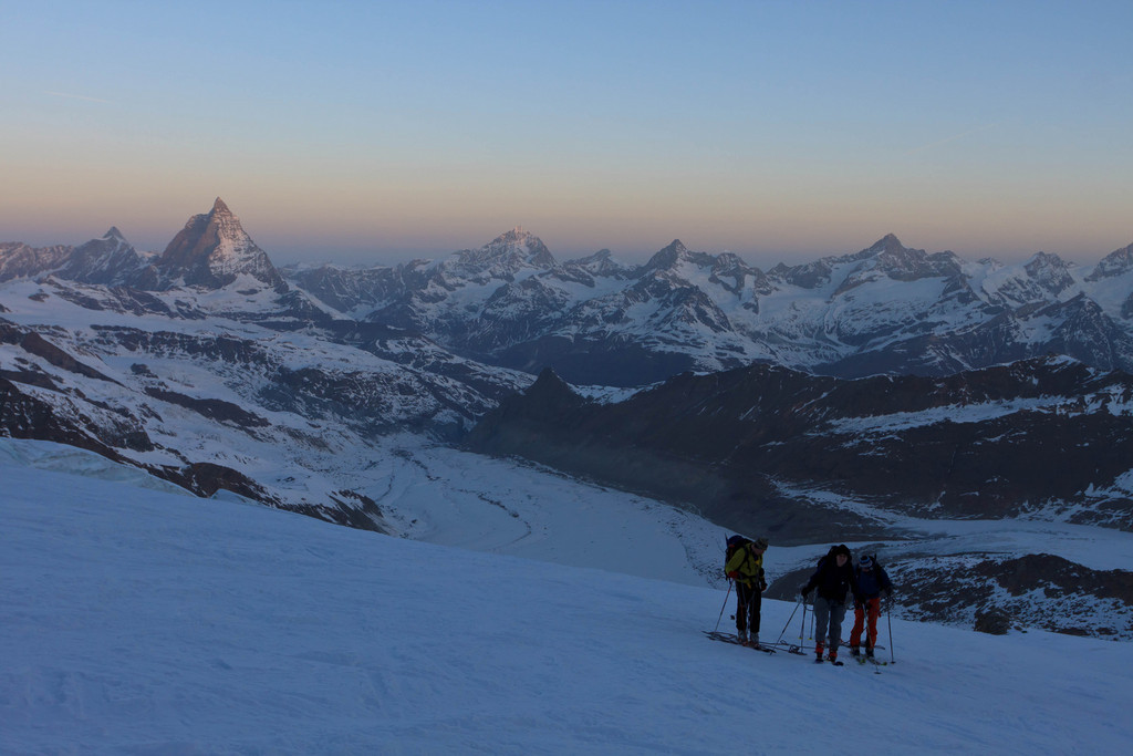 Skiers ascending Dufourspitze with Matterhorn, Dent Blanche etc behind (keywords: alpen, alps, berg, berge, dent blanche, dent d'hérens, leute, matterhorn, obergabelhorn, person, schweiz, sonnenaufgang, switzerland, valais, wallis, wellenkuppe, zinalrothorn, mountain, mountains, people, skier, sunrise, swiss, dent d'hrens) Skiers ascending Dufourspitze with Matterhorn, Dent Blanche etc behind (keywords: alpen, alps, berg, berge, dent blanche, dent d'hérens, leute, matterhorn, obergabelhorn, person, schweiz, sonnenaufgang, switzerland, valais, wallis, wellenkuppe, zinalrothorn, mountain, mountains, people, skier, sunrise, swiss, dent d'hrens)