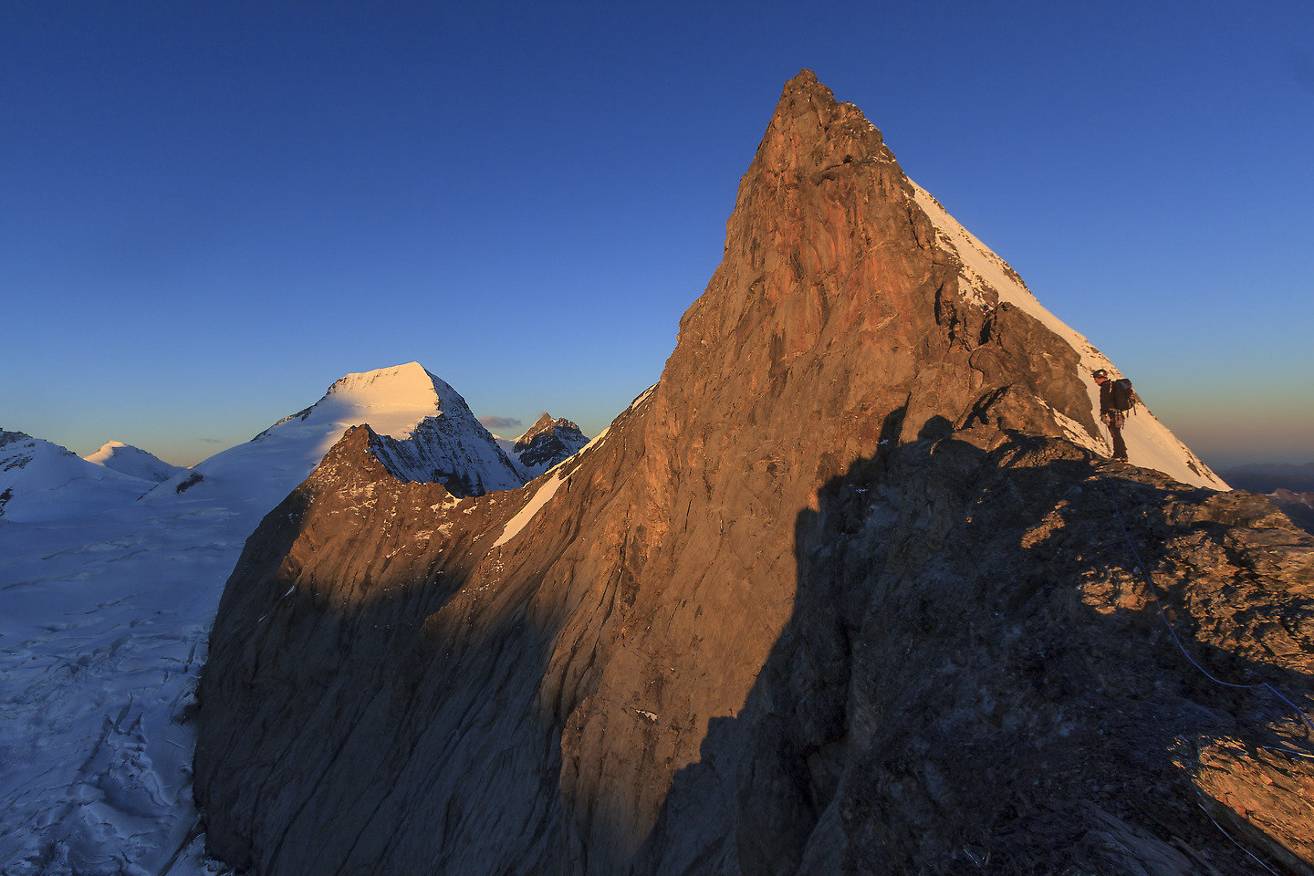 Sunrise on the Mittellegi ridge on the Eiger with the Mönch in the background (keywords: Dan, Eiger, Mittellegigrat, Mönch, Moench, climber, alpinist, climber, mountaineer, climber, Kletterer, climber, Bergsteiger, sunrise, Sonnenaufgang) Sunrise on the Mittellegi ridge on the Eiger with the Mönch in the background (keywords: Dan, Eiger, Mittellegigrat, Mönch, Moench, climber, alpinist, climber, mountaineer, climber, Kletterer, climber, Bergsteiger, sunrise, Sonnenaufgang)